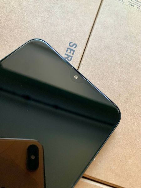 Дисплей для Samsung A105 Galaxy A10 2019 з чорним тачскріном та корпусною рамкою, Original (China) 1119941 фото